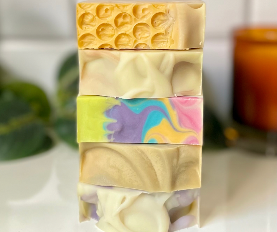 Variety of swirly soap tops, stacked up one on top of another.