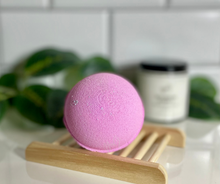 Load image into Gallery viewer, Purple round bath bomb on wooden soap tray
