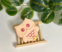 Load image into Gallery viewer, orange owl bath bomb on wooden tray
