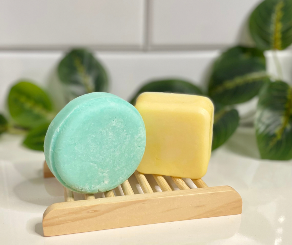 blue shampoo and conditioner bars on wooden tray