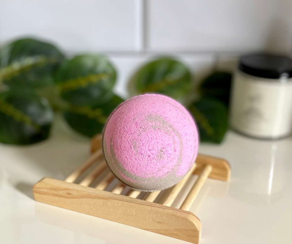 Gray and Pink round bath bomb on wooden soap tray