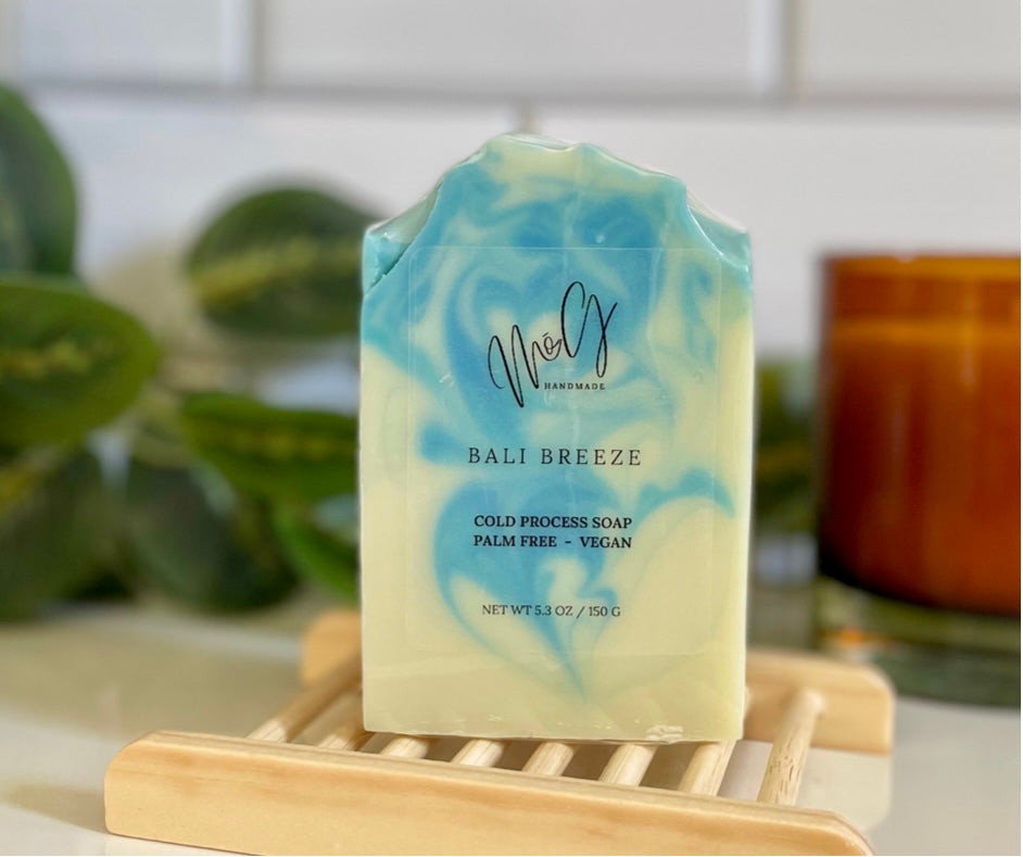White bar of soap with blue swirls